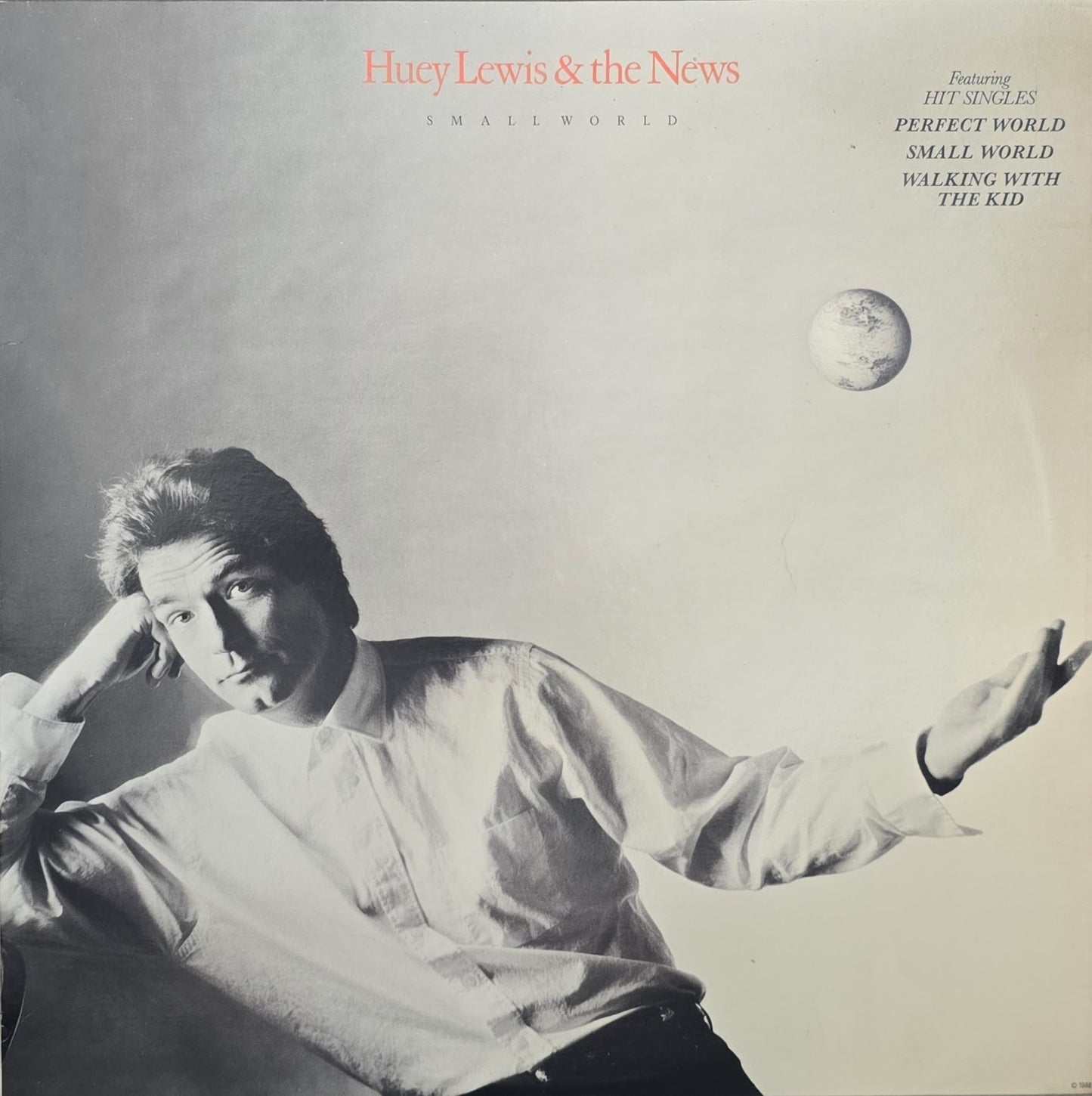 Huey Lewis & The News – Small World