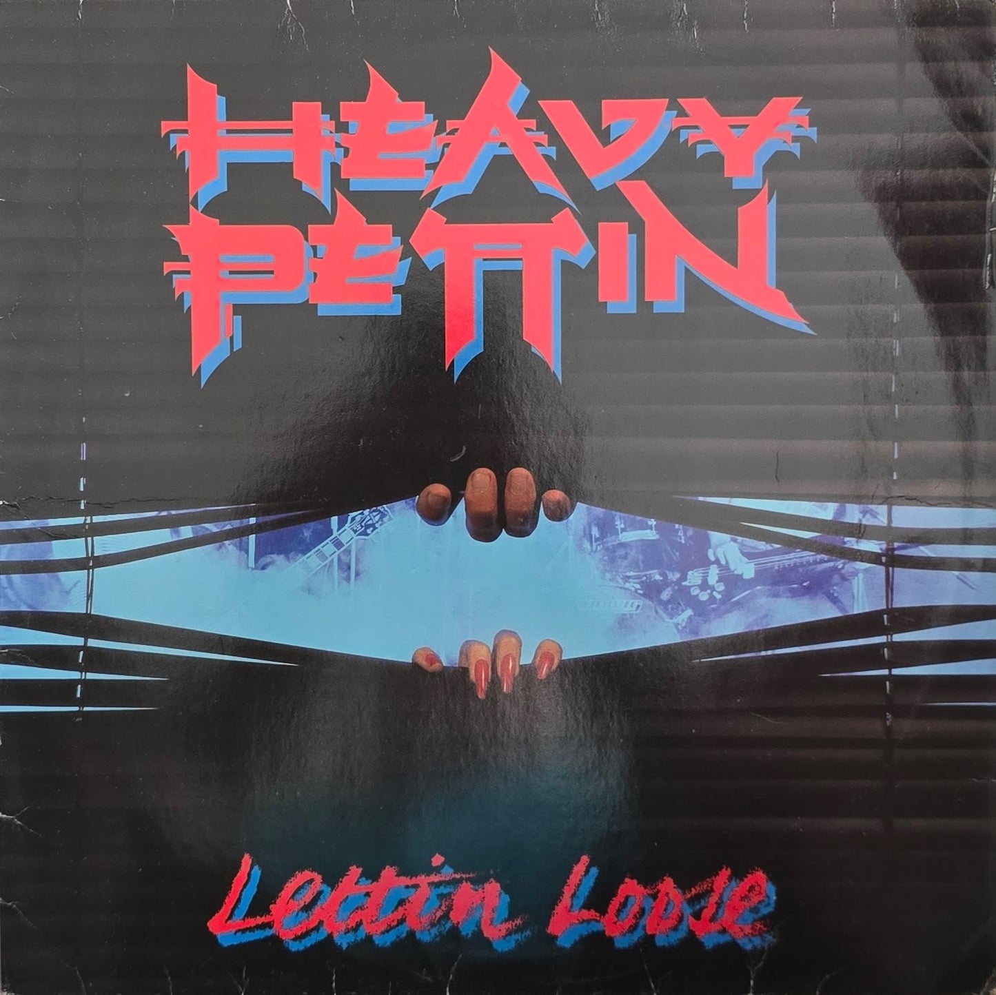 Heavy Pettin – Lettin Loose