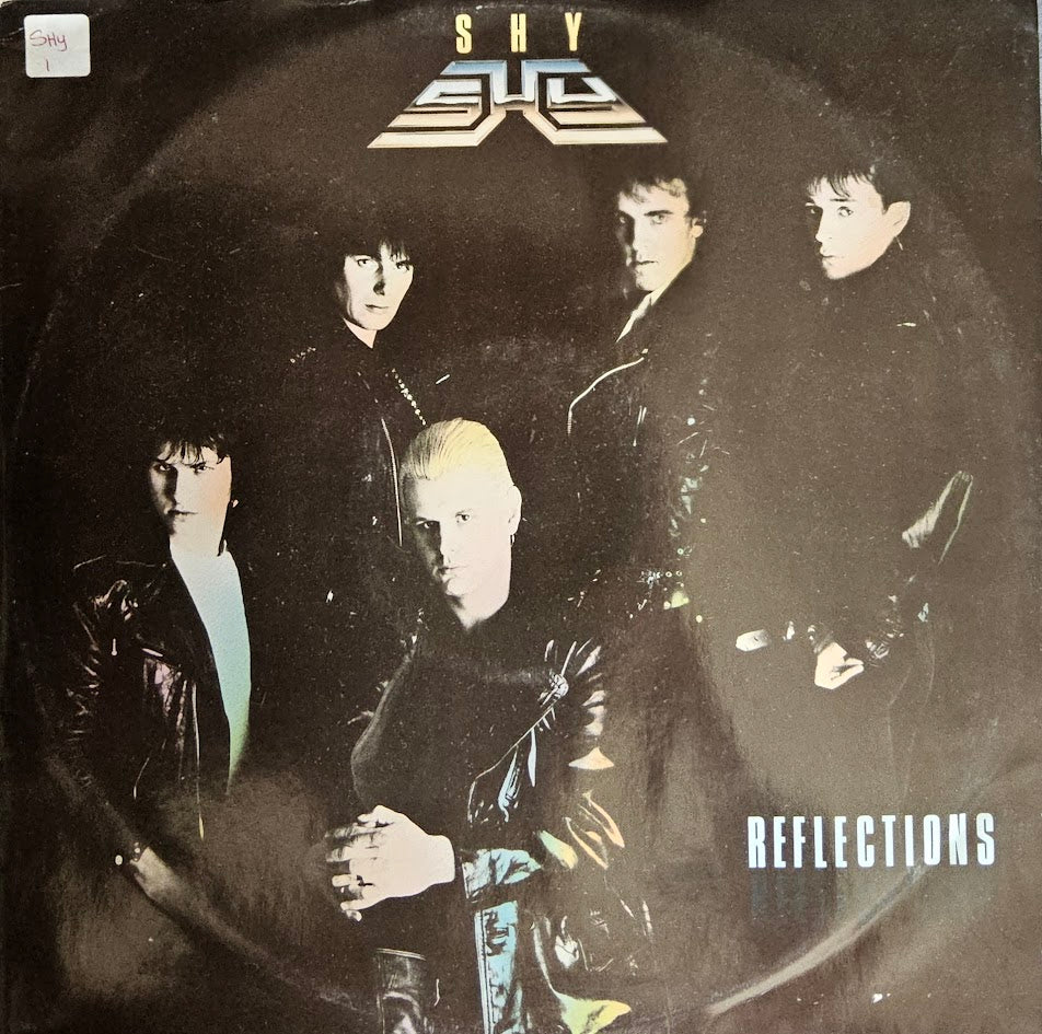 Shy – Reflections