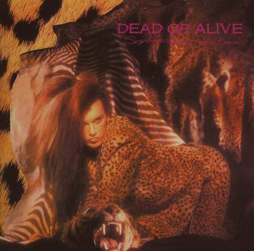 Dead Or Alive – Sophisticated Boom Boom (Purple)