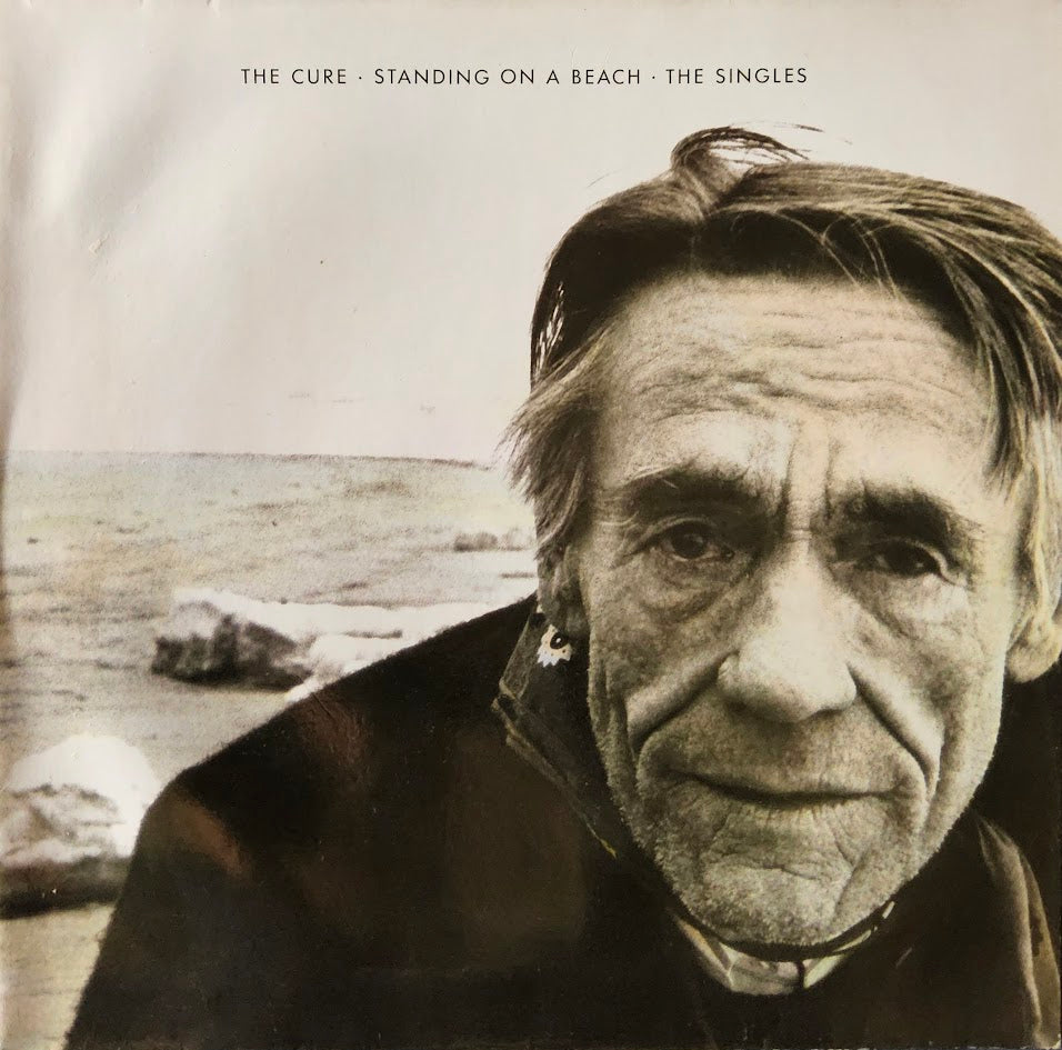The Cure – Standing On A Beach · The Singles